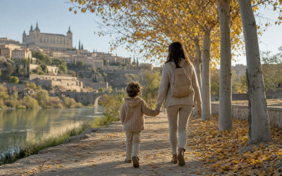 Madre y niño paseando de espaldas por un sendero junto al río en otoño - blog de Clínica Lazos